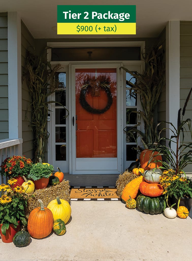Tier 2 fall porch décor package with specialty pumpkins, straw bales, and seasonal flowers
