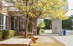 Professionally landscaped school grounds in Wisconsin featuring manicured lawns, maintained walkways, mature trees, and welcoming outdoor spaces for students, teachers, and staff.